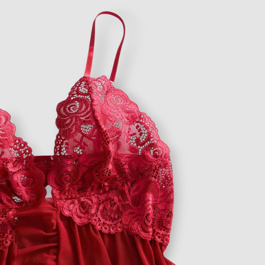 Red lace lingerie set on a light grey background