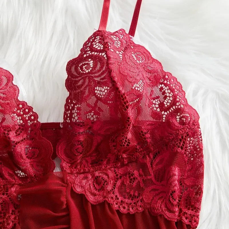 Red lace lingerie set on a white background