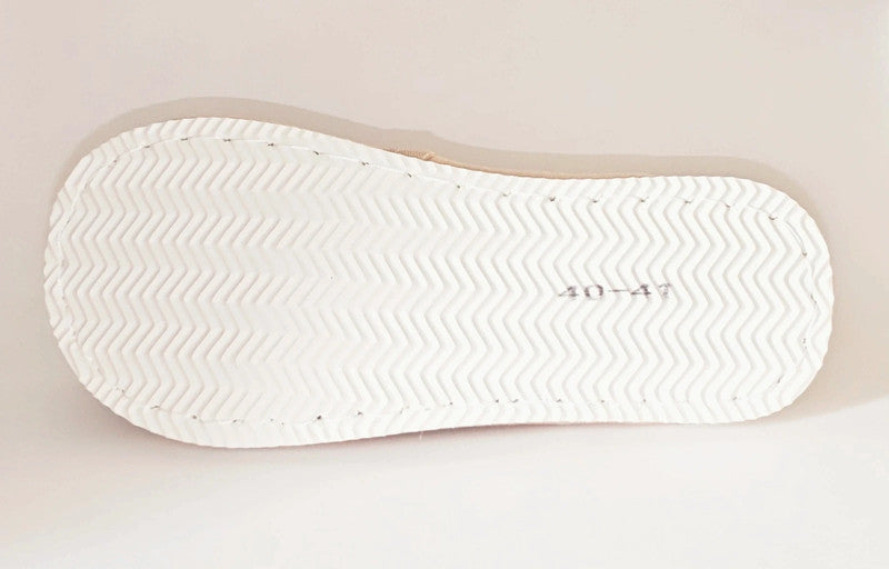 Elegante pantufla de mujer con lazo