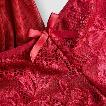 Close-up of a red lace fabric with a bow