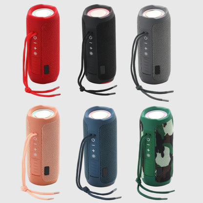 A collection of T&G Portable Bluetooth Speakers in various colors including red, black, gray, pink, blue, and green, each featuring a compact cylindrical design with a strap.